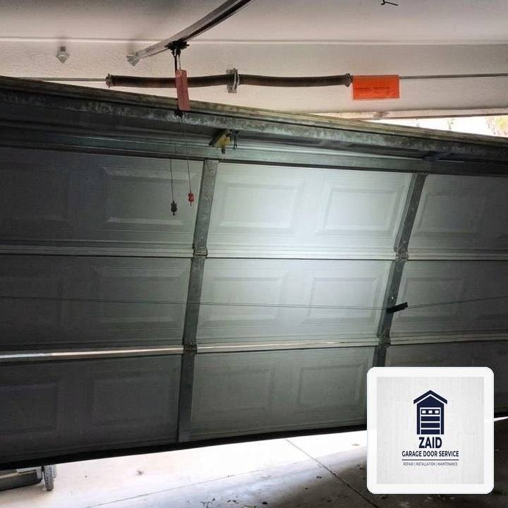 Off-Track Garage Door Emergency Realignment & Laser Calibration in Melrose, MA